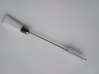 Štěteček na čištění šících strojů